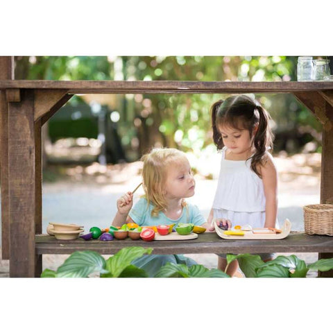 Kid playing PlanToys Assorted Fruit & Vegetable