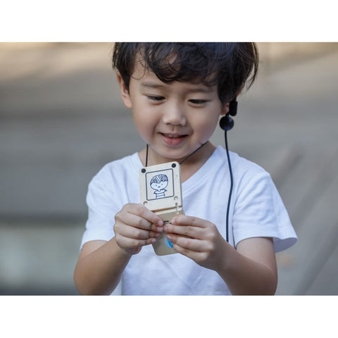 Kid playing PlanToys Secret Agent Play Set