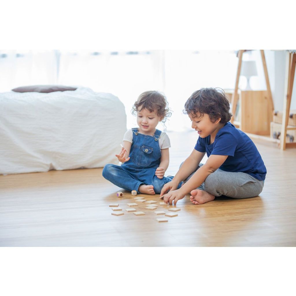 Kid playing PlanToys Finding An Elephant