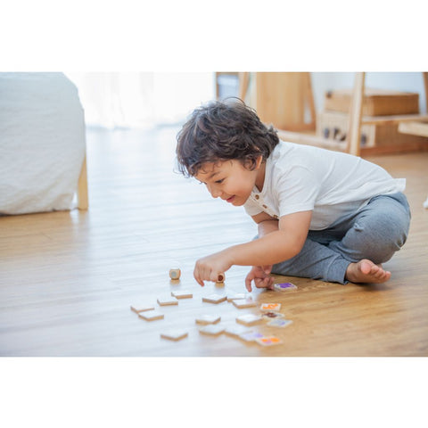 Kid playing PlanToys Finding An Elephant