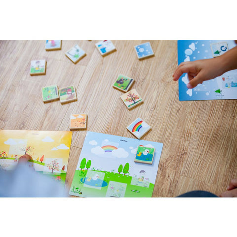 Kid playing PlanToys Seasonal Bingo