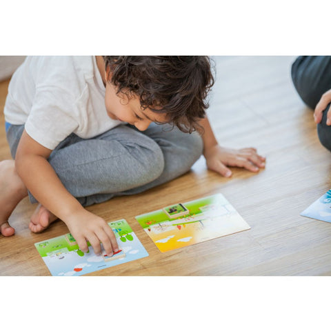 Kid playing PlanToys Seasonal Bingo