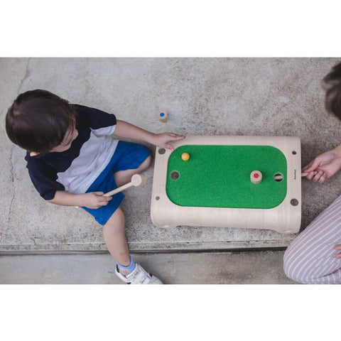 Kid playing PlanToys Magnetic Board Game