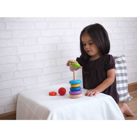 Kid playing PlanToys Stacking Ring