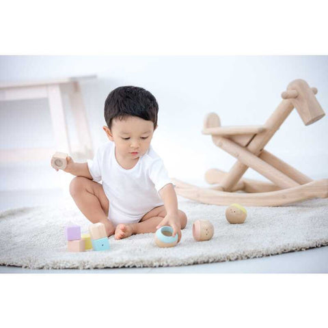 Kid playing PlanToys Sensory Tumbling