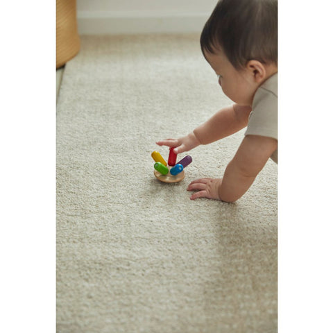 Kid playing PlanToys Flexi Jellyfish