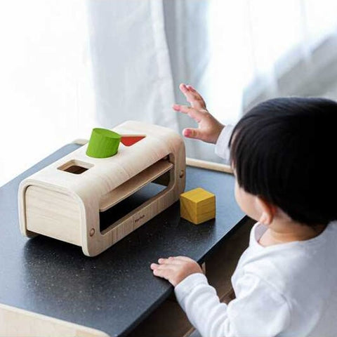 Kid playing PlanToys Shape & Sort