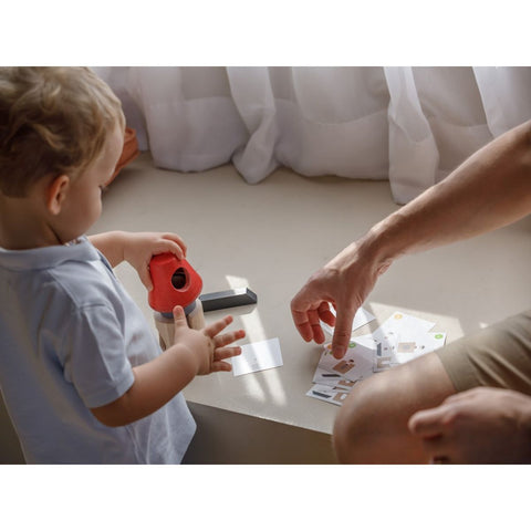 Kid playing PlanToys Spatial Rocket