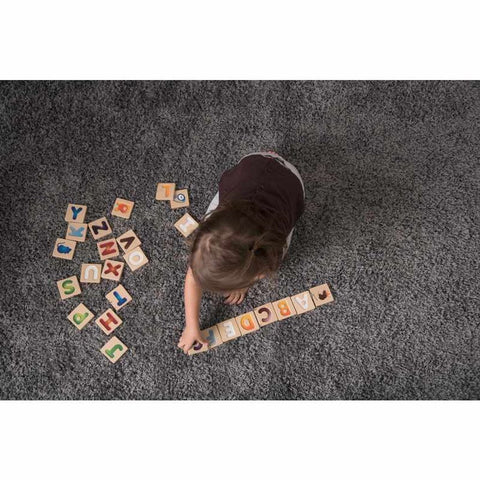 Kid playing PlanToys Alphabet A-Z (Gradient)