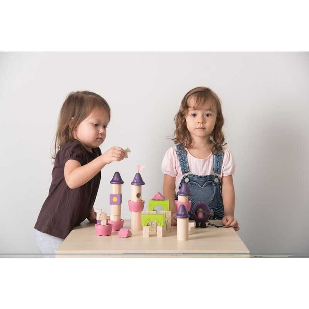 Kid playing PlanToys Fairy Tale Blocks