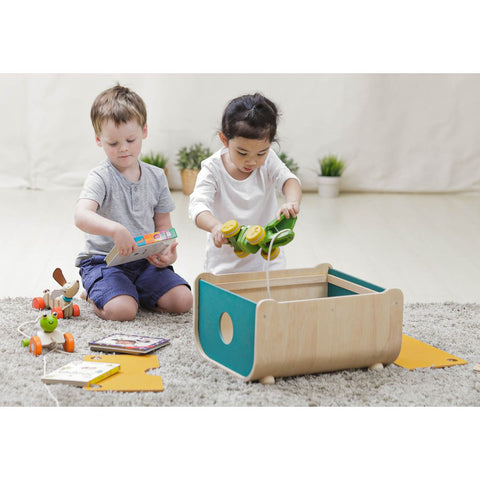 Kid using PlanToys Toy Chest