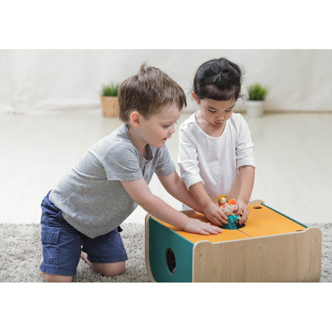 Kid using PlanToys Toy Chest