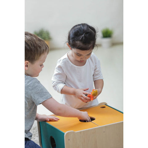 Kid using PlanToys Toy Chest