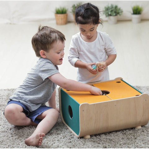 Kid using PlanToys Toy Chest