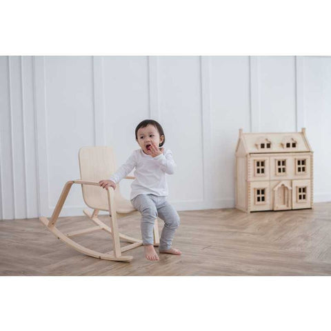 Kid using PlanToys Rocking Chair