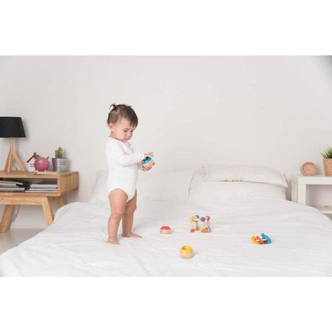 Kid playing PlanToys Sensory Tumbling