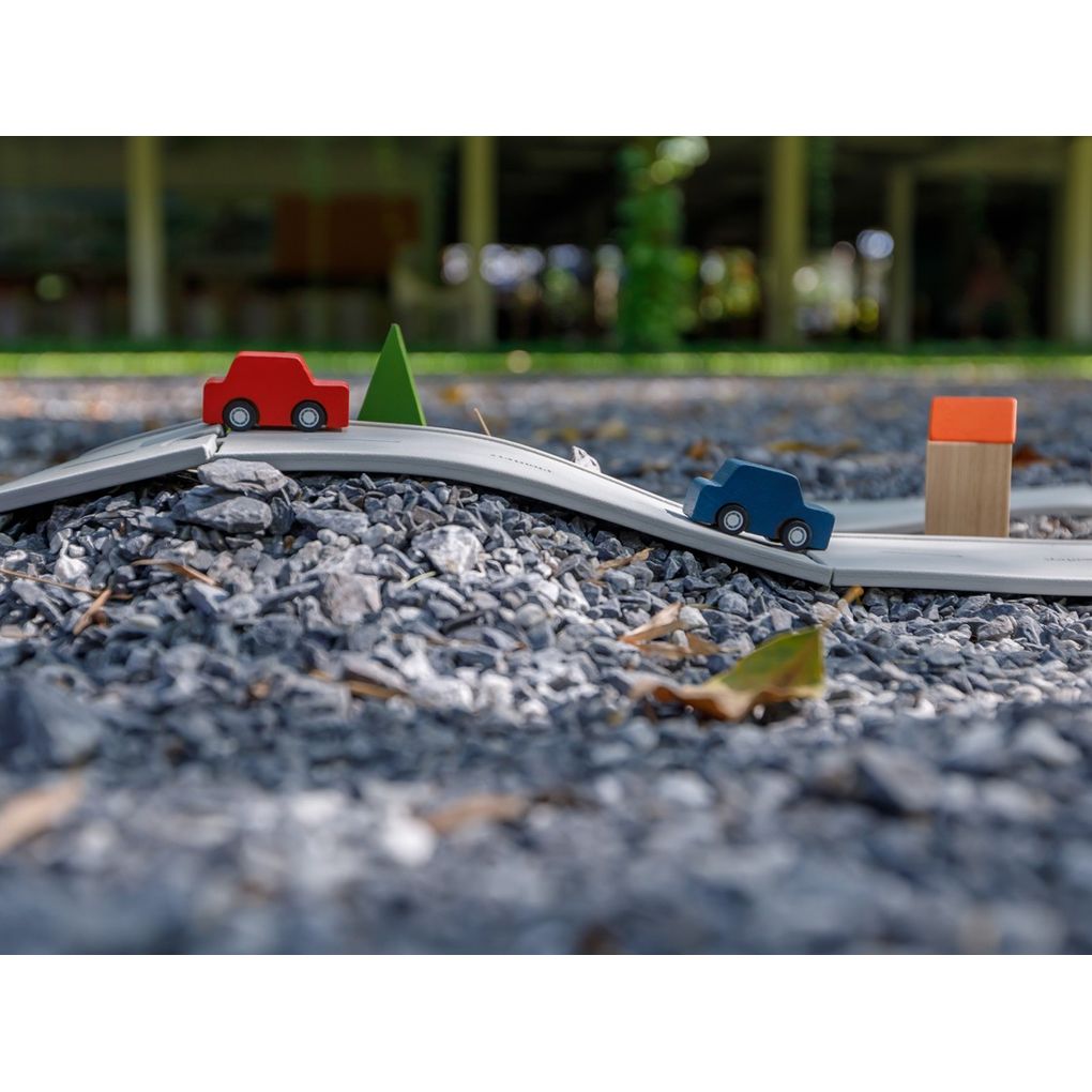 Kid playing PlanToys Rubber Road & Rail Set - Medium