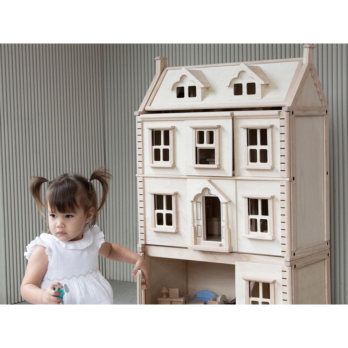 Plan Toys - Maison de poupée en bois brut mobile et modulable Plan